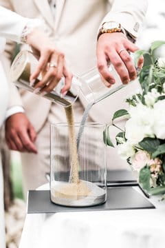 The ritual of mixing sands during the outdoor Symbolic Wedding in Krakow, Poland